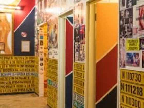 Vibrant hallway decorated with images and text