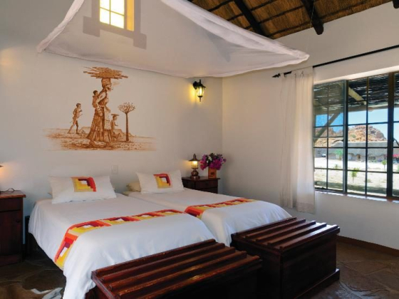 Inviting room featuring local artwork and natural light.