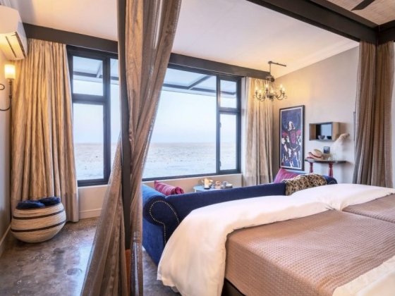 Stylish room featuring seaside views and modern furnishings.