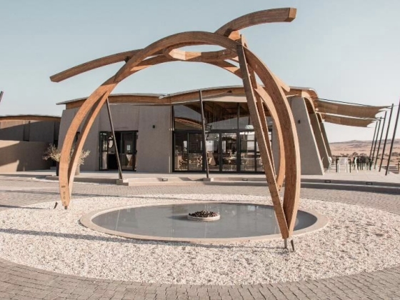 A contemporary building featuring unique wood designs.