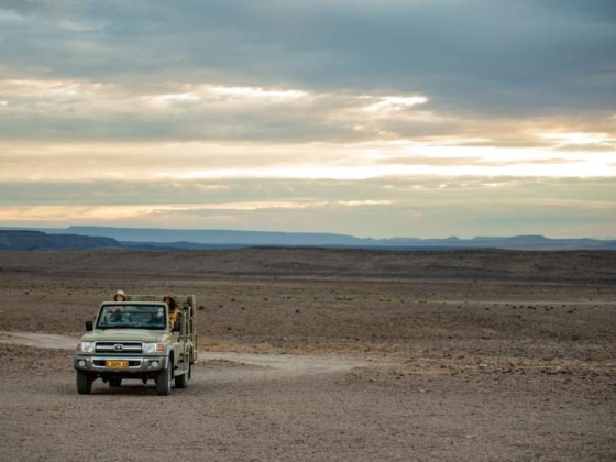 Adventure seekers in a remote, arid environment.
